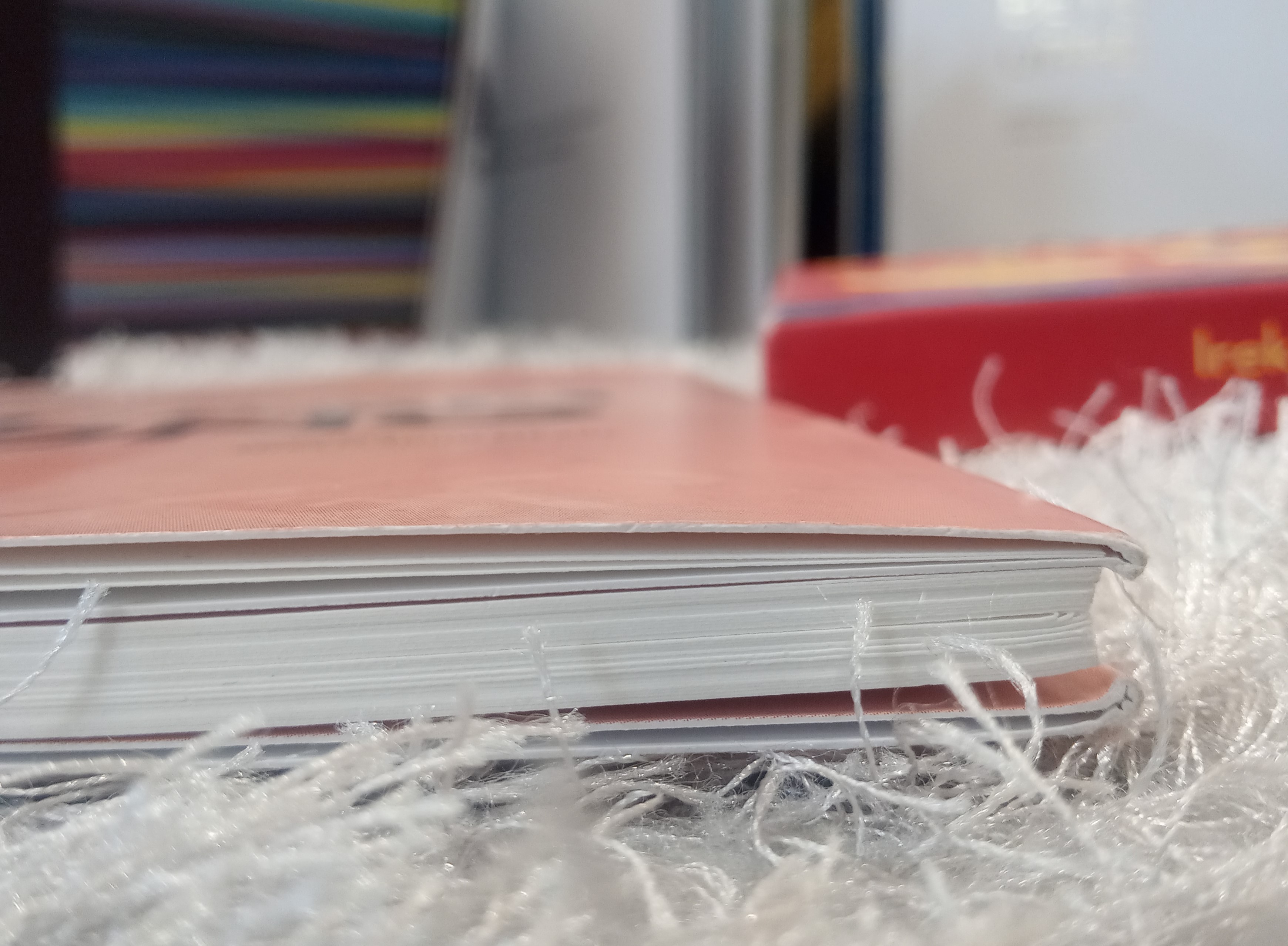 Tapakien gainean, irakurketaren tapakia josten